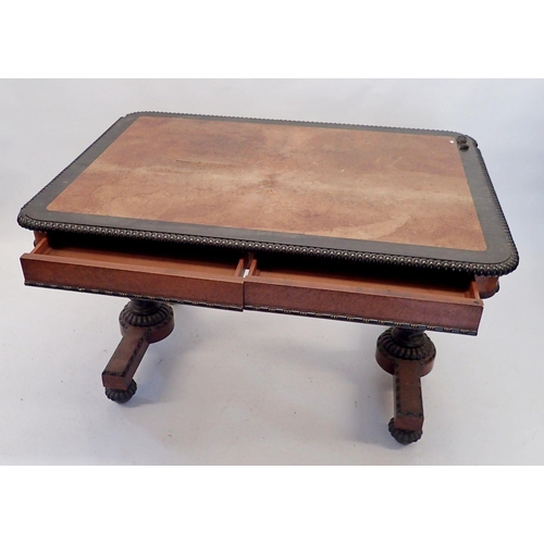 1134 - An early Victorian walnut and ebony library or centre table with gadrooned border, turned column end... 