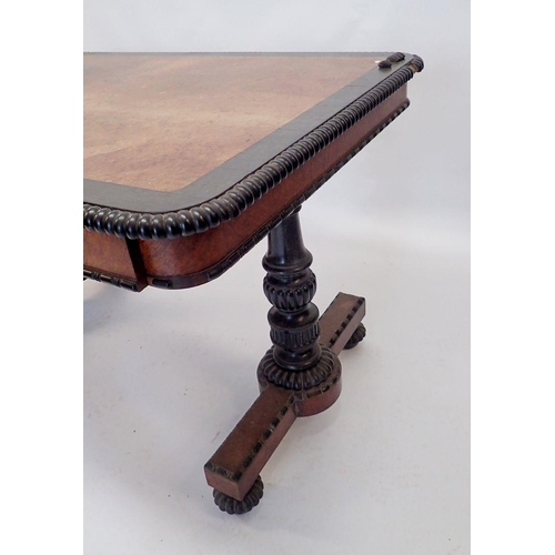 1134 - An early Victorian walnut and ebony library or centre table with gadrooned border, turned column end... 