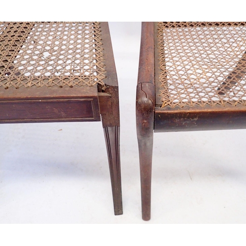 1135 - A pair of Regency cane seated chairs and one other all with sabre supports