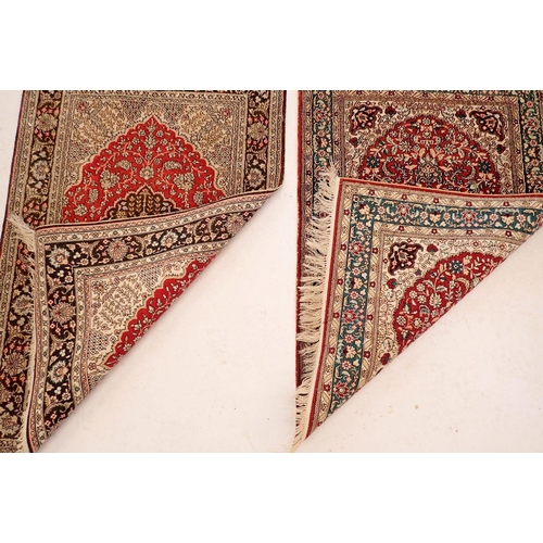 1136 - Two Persian small rugs with medallion designs, 92 x 62cm