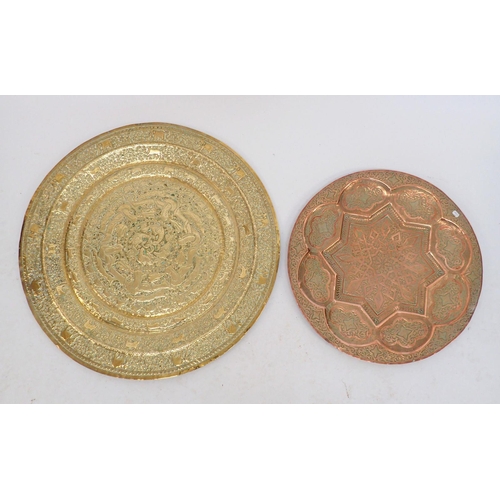 1141 - Two Islamic brass and copper trays, largest 61cm diameter