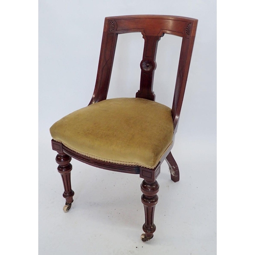 1145 - A set of four Victorian mahogany Etruscan style slope back dining chairs with incised decoration