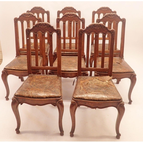 1146 - A set of eight French slat back dining chairs with trellis and scrollwork carved top rail