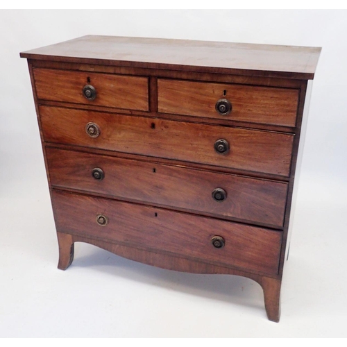 1162 - An early 19th century mahogany chest of two short and three long drawers all on splay supports, all ... 