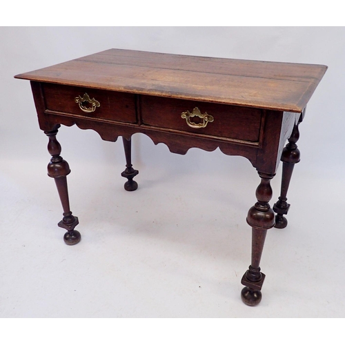 1166 - A 17th century side table with two drawers on inverted baluster supports, 96 x 58cm