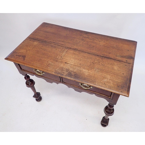 1166 - A 17th century side table with two drawers on inverted baluster supports, 96 x 58cm