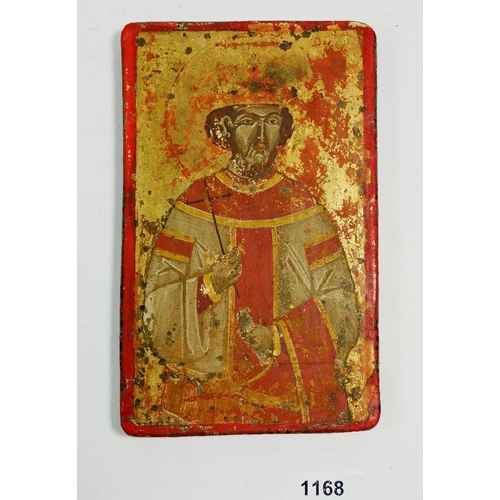 1168 - An antique painted wood and gesso icon depicting a saint, 20 x 12.5cm