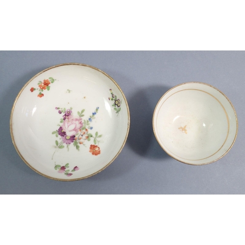 117 - An 18th century Meissen tea cup and saucer painted flowers