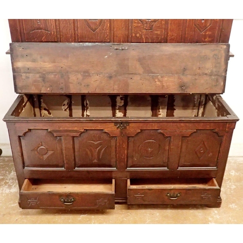 1178 - A Victorian oak mule chest with carved and panelled front and later matching back panel, 144cm wide