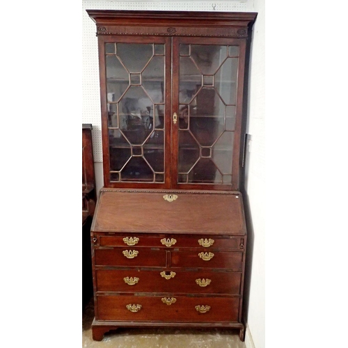 1181 - A George III mahogany bureau bookcase, the carved cornice over pair of astragal glazed doors, the ba... 