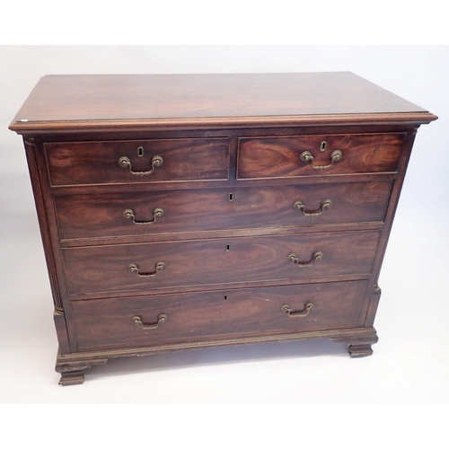 1189 - A Georgian mahogany chest of two short and three long drawers flanked by reeded pilasters on ogee br... 