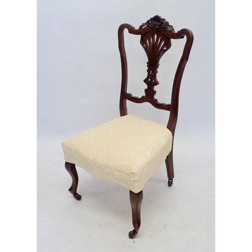 1201 - A late Victorian French style nursing chair with carved shell decoration