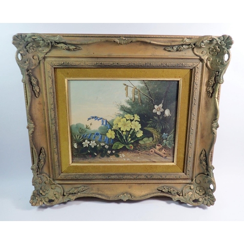 1205 - A Victorian oil still life primroses and other spring flowers in the style of Oliver Clare, 22 x 27c... 