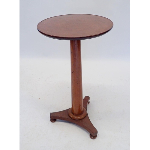 1208 - A 19th century small mahogany occasional table with circular top on tapered column and triple base