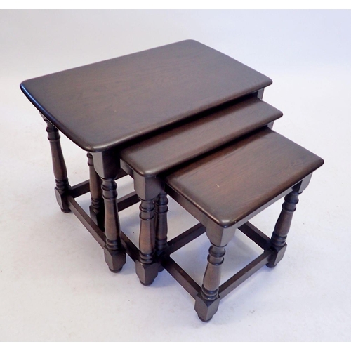 1210 - A nest of three oak occasional tables, 61 x 37.5 x 47cm