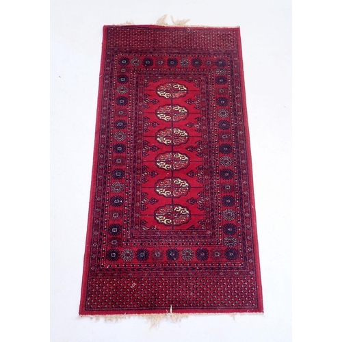 1212 - A Prado Orient Keshan super wool rug of red ground, 175 x 90cm