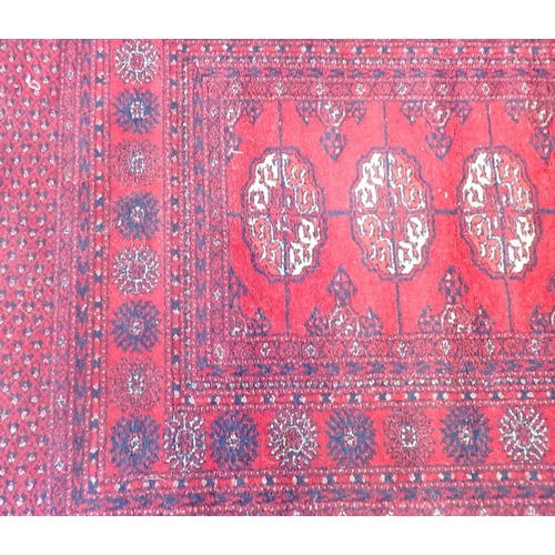 1212 - A Prado Orient Keshan super wool rug of red ground, 175 x 90cm