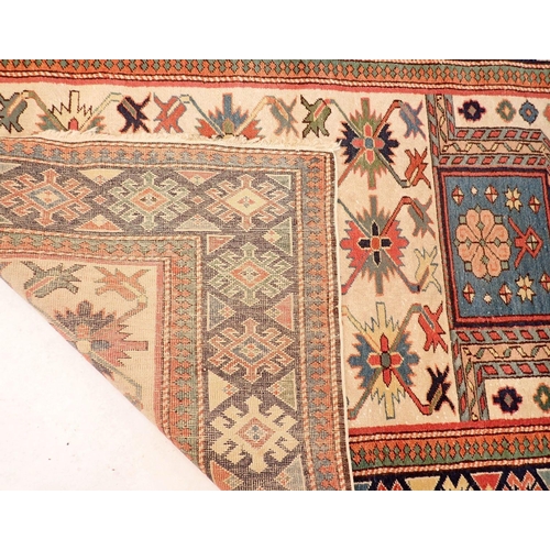 1216 - A Caucasian prayer rug with stylised floral motifs on a cream ground 147x109cm