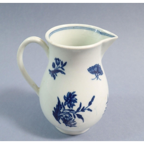 124 - An 18th century Worcester sparrow beak cream jug with three flowers pattern, 'W' mark to base, 9cm