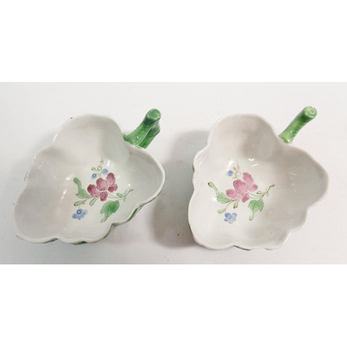 130 - A pair of 18th century Doccia leaf form butter boats moulded leaves and painted flowers, 9.5cm x 6.5... 