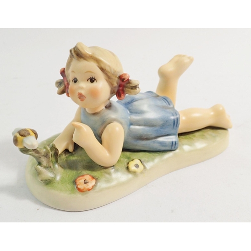 139 - A Hummel Exclusive Edition figure of a girl with bird