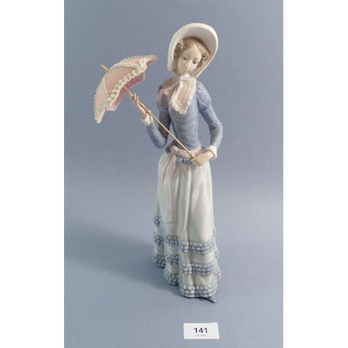 141 - A Lladro figure girl with umbrella