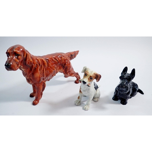 23 - A Royal Doulton Red Setter, 13.5cm tall, a sitting Jack Russell and a Scottie, 9cm each (3)