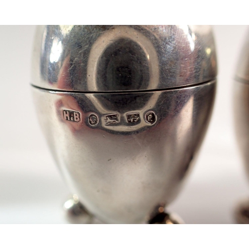 252 - A Victorian small silver three piece egg form cruet set, 141g by Henry Bourne Birmingham 1879 - lids... 