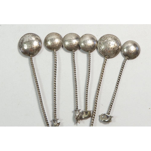 284 - Six Indian white metal small spoons with animal terminals and coin bowl