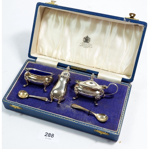 288 - A silver Mappin & Webb, three piece cruet set, boxed with spoons, Birmingham 1966