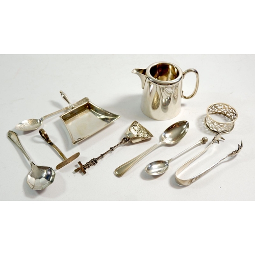 290 - A silver napkin ring, pusher, two teaspoons and a 900 standard windmill caddy spoon, 74g and a small... 