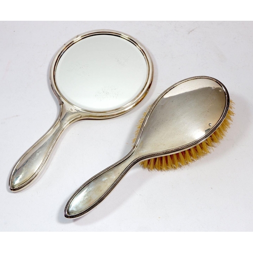 291 - A silver brush and mirror, Birmingham 1925 by Adie Brothers Ltd.