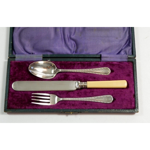 300 - A silver christening set with fork and spoon, Sheffield 1917 by James Deakin plus silver plated knif... 