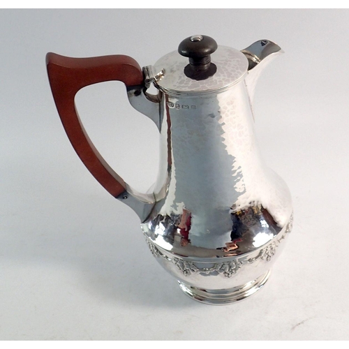 307 - An Arts & Crafts silver coffee jug, Birmingham 1918 by AE Jones, 305g, 19cm tall