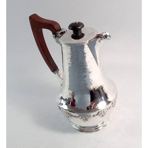 307 - An Arts & Crafts silver coffee jug, Birmingham 1918 by AE Jones, 305g, 19cm tall