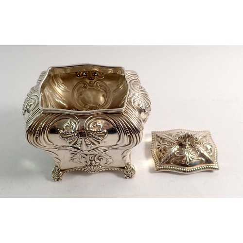 308 - A late Victorian silver embossed bombe form tea caddy, London 1899 by Thomas Bradbury & Sons, 252.6g... 