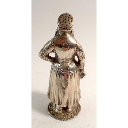 309 - A novelty silver pepper pot in the form of a Dutch woman marked 'Marken' 60.3g, 9.5cm tall