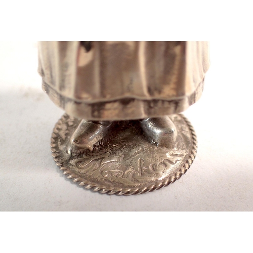 309 - A novelty silver pepper pot in the form of a Dutch woman marked 'Marken' 60.3g, 9.5cm tall