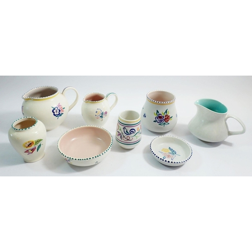 34 - A collection of Poole Pottery jugs, vases and dishes (8)
