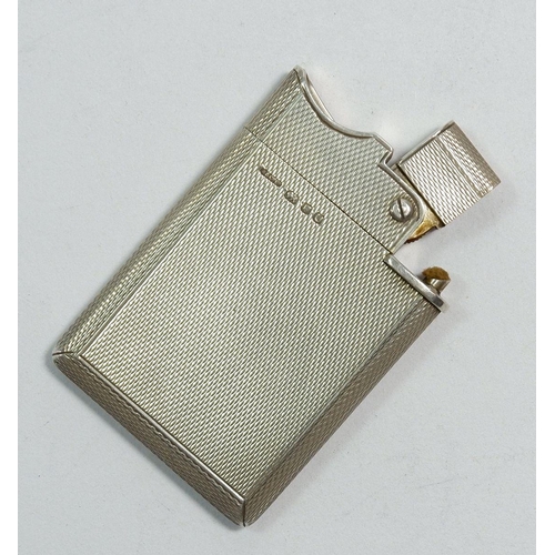 347 - An Asprey silver wafer lighter, engine turned decoration, 45.5g, London 1955