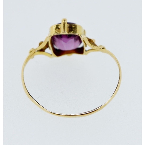 376 - A Victorian gold amethyst ring on floral shoulders, 2g, size R-S