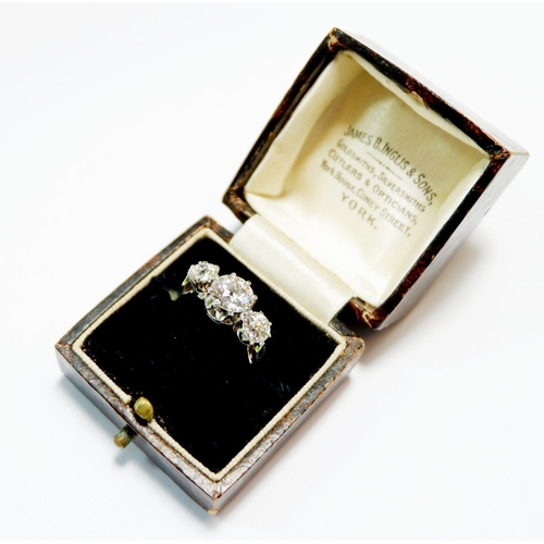 379 - A fine quality platinum set three stone diamond ring, 2.5 cts in total, size M