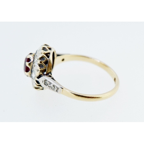 380 - An antique 18 carat gold ruby and diamond oval cluster ring, size L to M, cluster 1.2 x 1cm