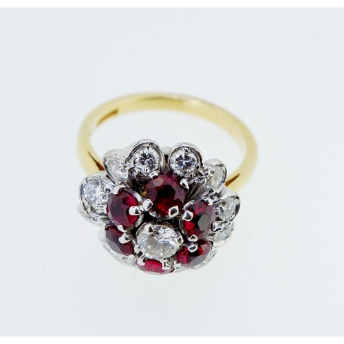 381 - An 18 carat gold ruby and diamond cluster ring, size K, 6.4g