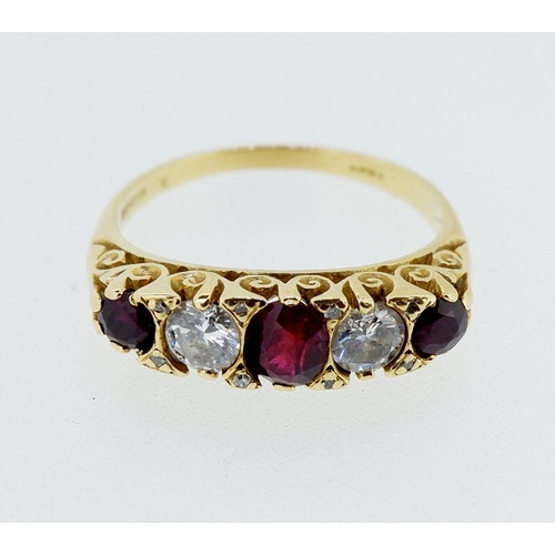 388 - An 18 carat gold ruby and diamond ring, size P to Q, 4.7g