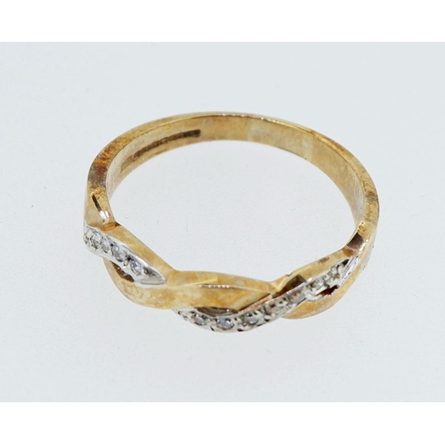 389 - A 9 carat gold diamond set intertwined ring, size O, 2.5g