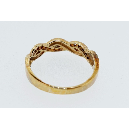 389 - A 9 carat gold diamond set intertwined ring, size O, 2.5g