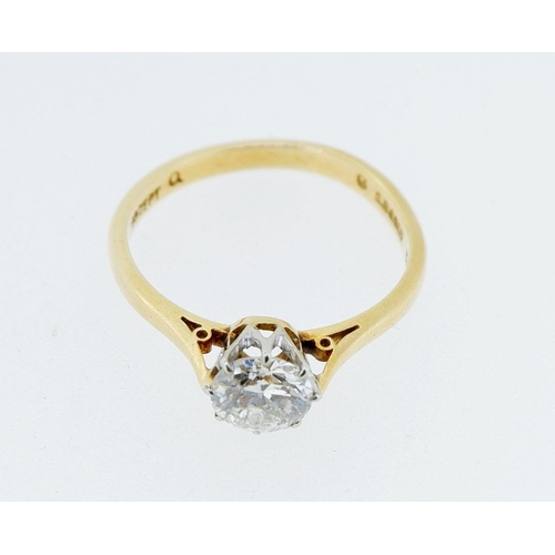 390 - An 18 carat gold solitaire diamond ring, 65 pts, size I to J, 1.8g