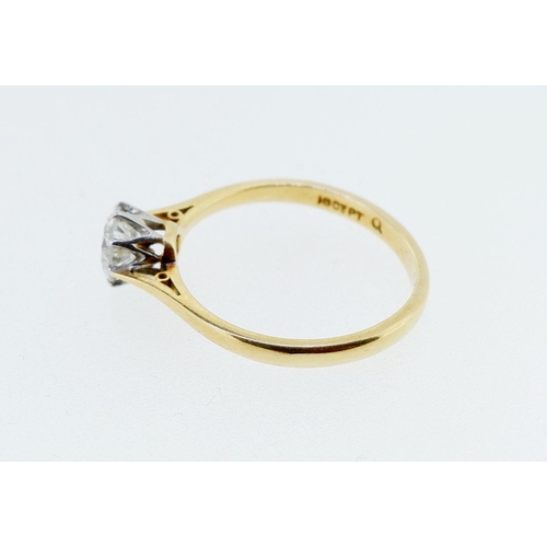 390 - An 18 carat gold solitaire diamond ring, 65 pts, size I to J, 1.8g