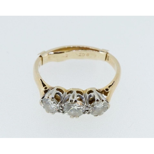 394 - An 18 carat gold and platinum set three stone diamond ring, approx 3/4 carats, size N to ), 3g, ring... 